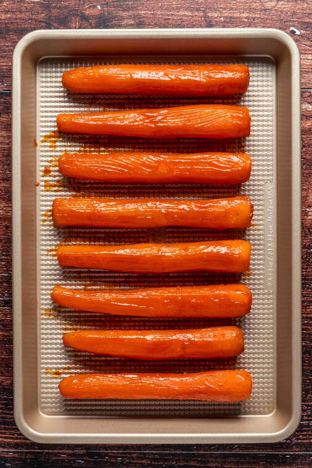 Carrots on a baking sheet.