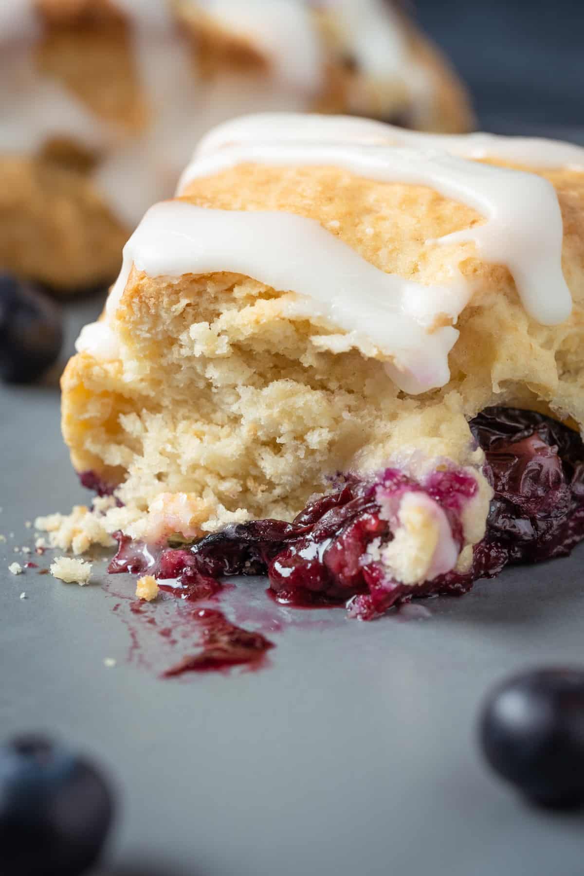 Vegan blueberry scone cut in half.