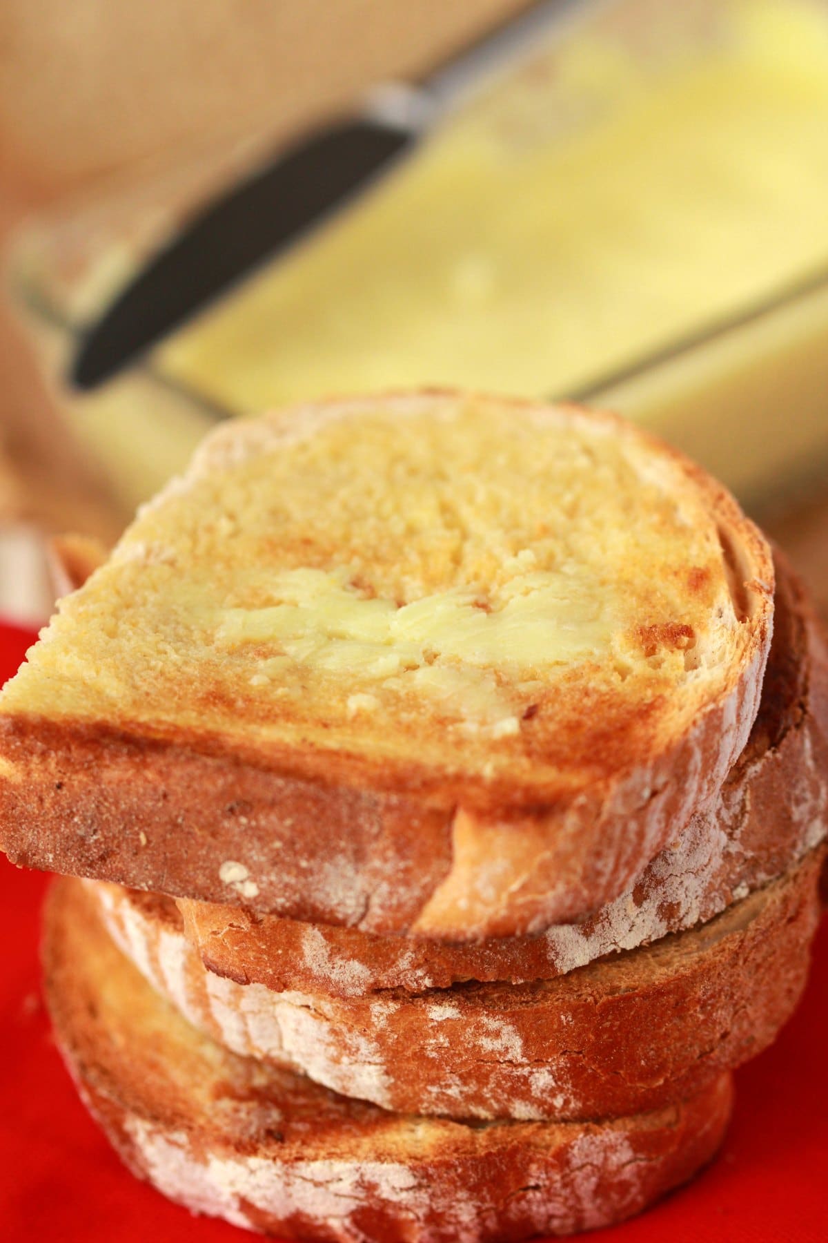 Slices of toast spread with homemade vegan butter. 