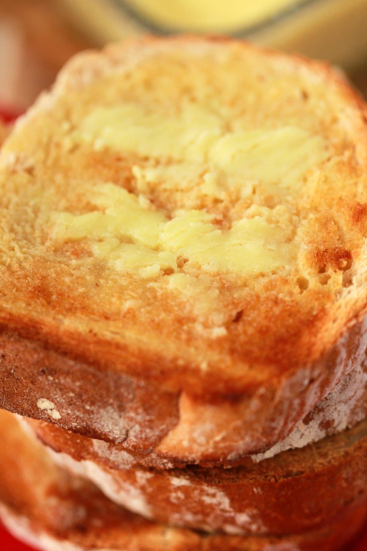 Slices of toast spread with homemade vegan butter. 