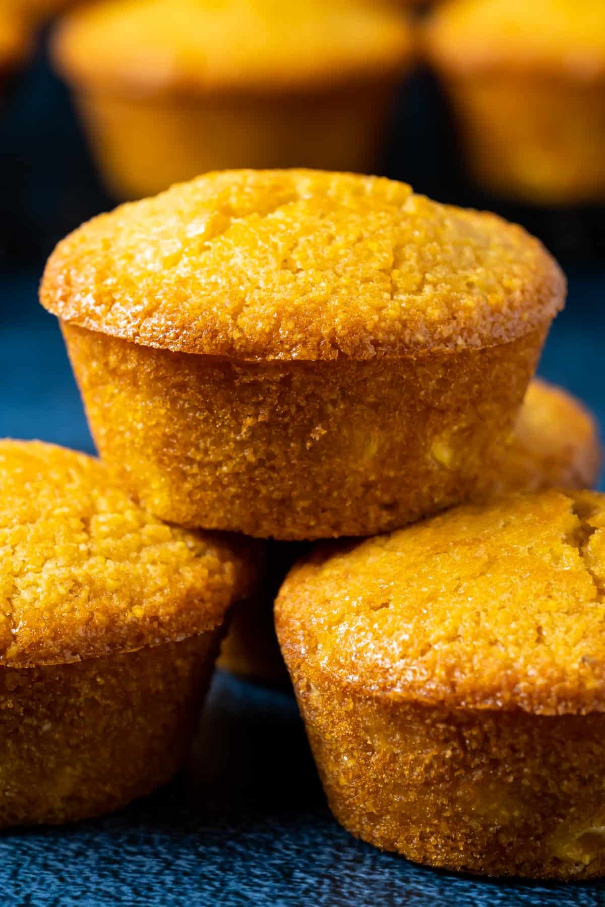 Vegan cornbread muffins in a stack. 