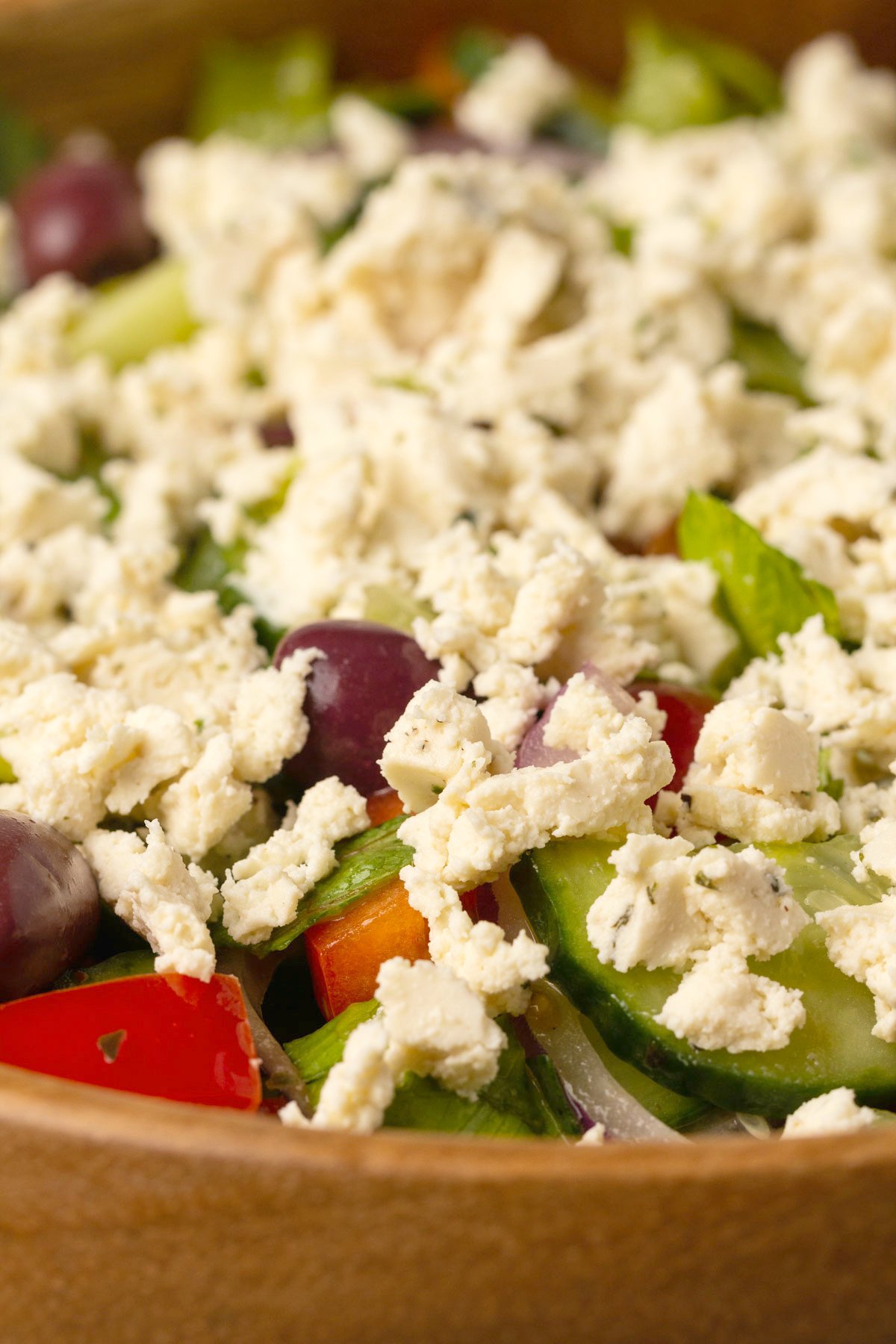 Vegan feta cheese crumbled on top of a salad. 