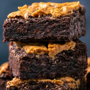 Stack of vegan peanut butter brownies.