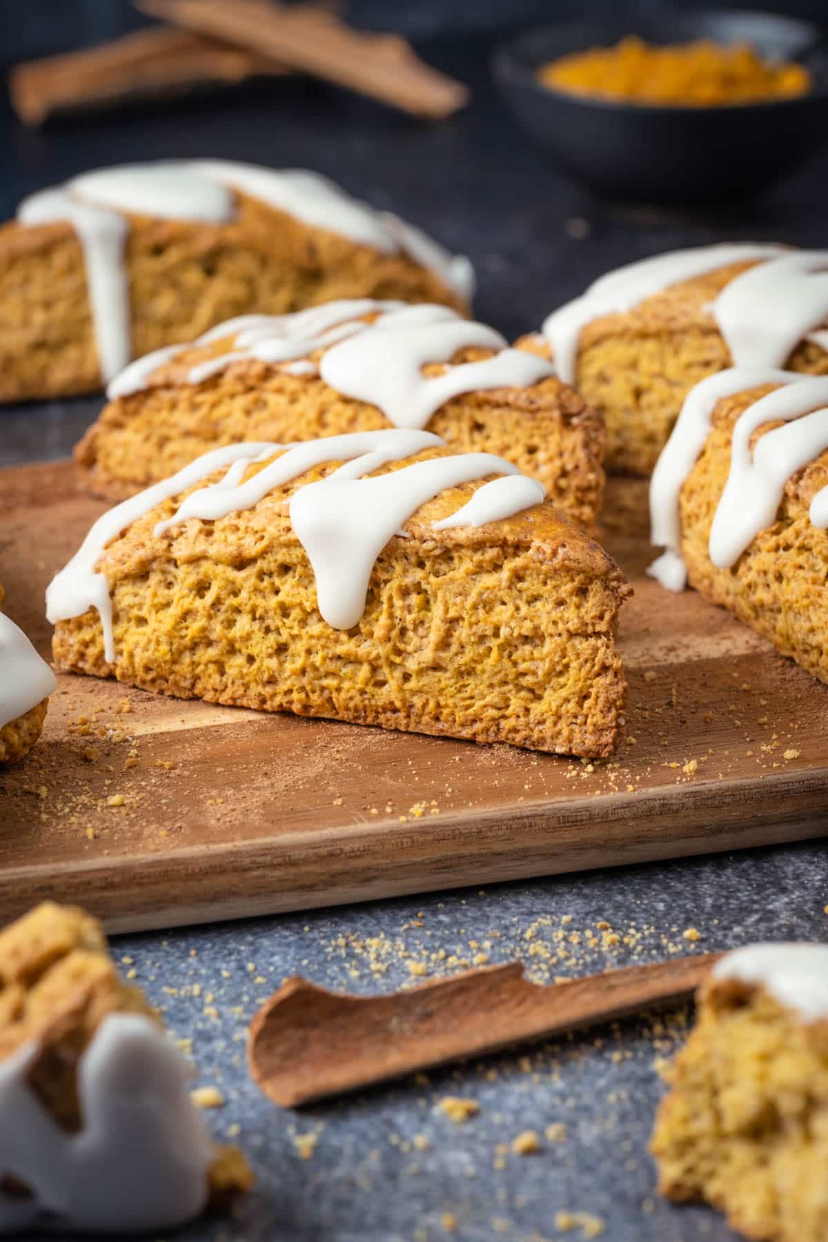 Pumpkin scones on a wooden board.