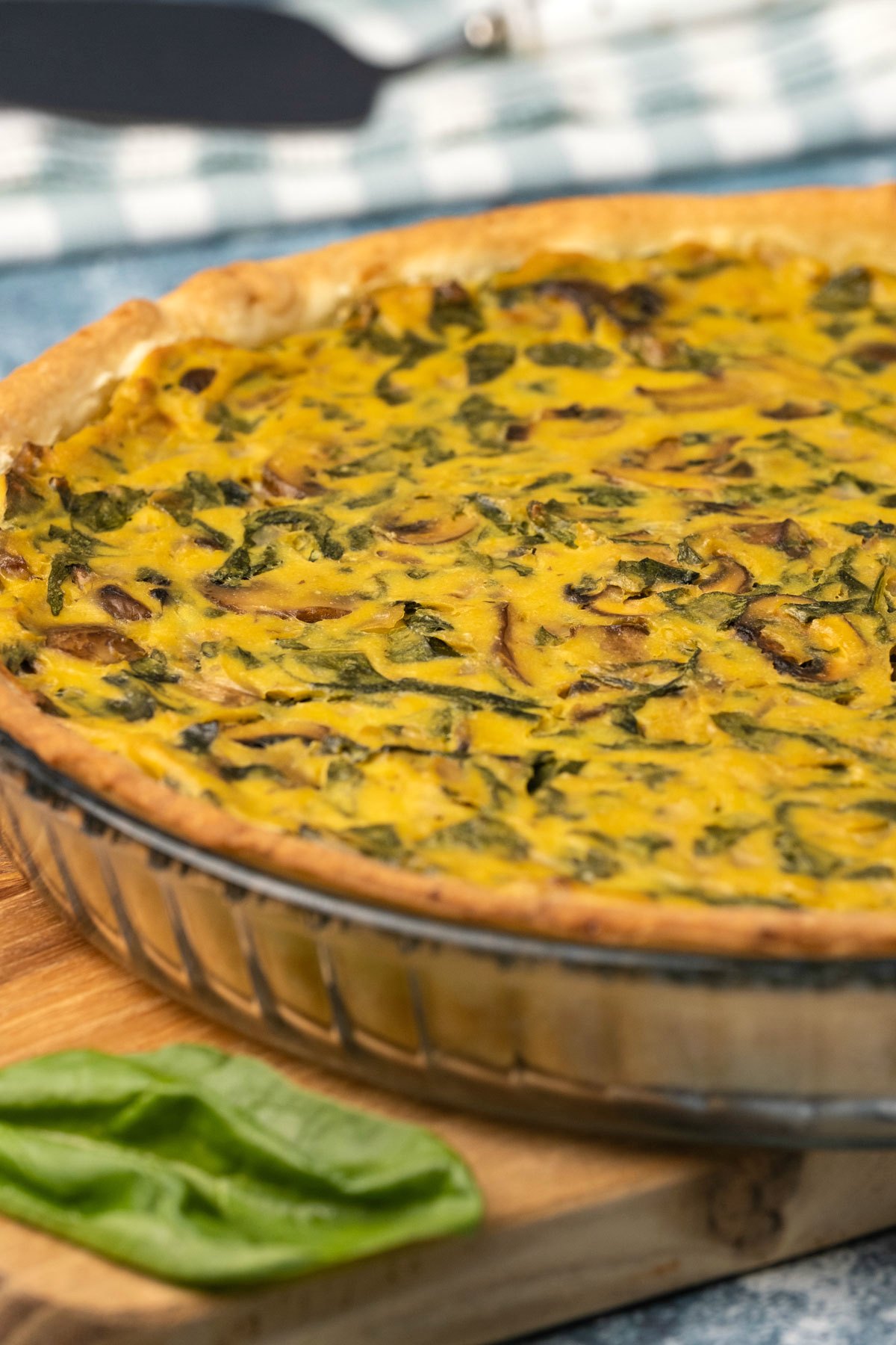 Vegan quiche in a glass pie dish. 