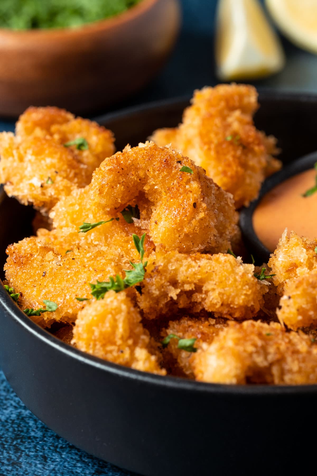 Vegan shrimp stacked up on a plate.